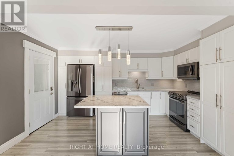 28502747/599-donald-street/overbrookcastle-heights/ottawa/ontario/K1K1L3_12