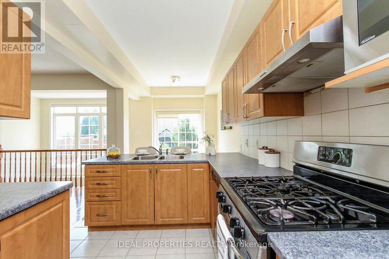 28714023/565-pepperville-crescent-n/emerald-meadowstrailwest/ottawa/ontario/K2M0E6_12