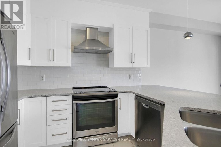 28401645/438-meadowbreeze-drive/emerald-meadowstrailwest/ottawa/ontario/K2M2T6_12