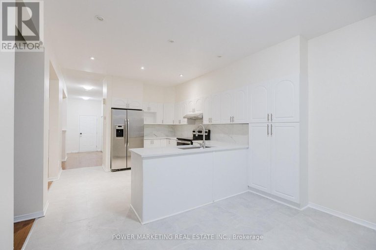 29074509/318-rustic-hills-crescent/springridgeeast-village/ottawa/ontario/K4A5A8_12