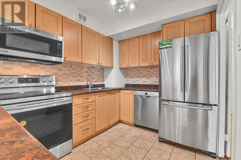 29416730/344-515-st-laurent-boulevard/viscount-alexander-park/ottawa/ontario/K1K3X5_17