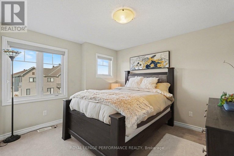 29669159/504-yellow-birch-street/mer-bleuebradley-estatesanderson-park/ottawa/ontario/K1W0J3_23