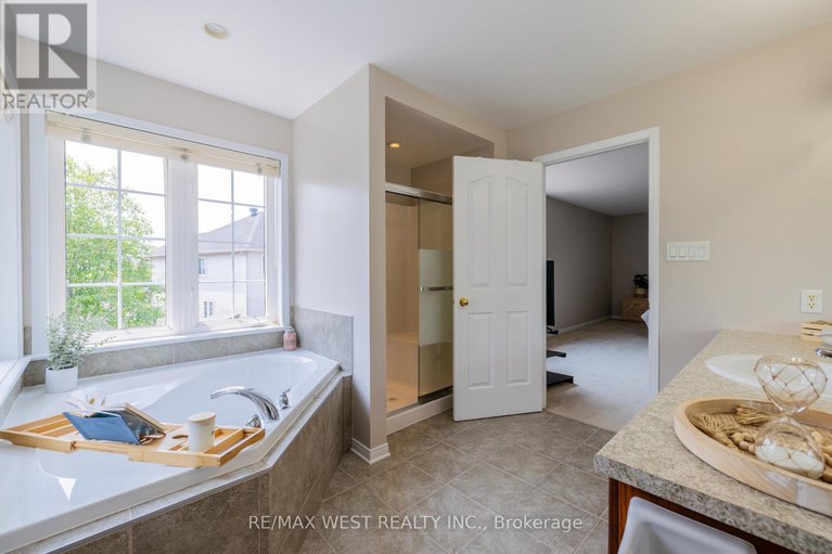 28441775/214-castlegarth-crescent/stonebridge/ottawa/ontario/K2J5N6_16