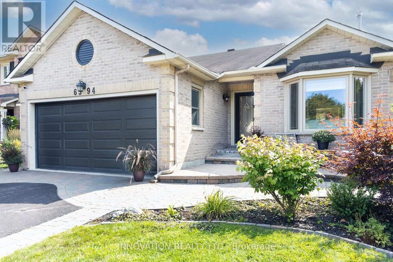 28853469/6594-delorme-avenue/orleanssunridge/ottawa/ontario/K1C6N6_1