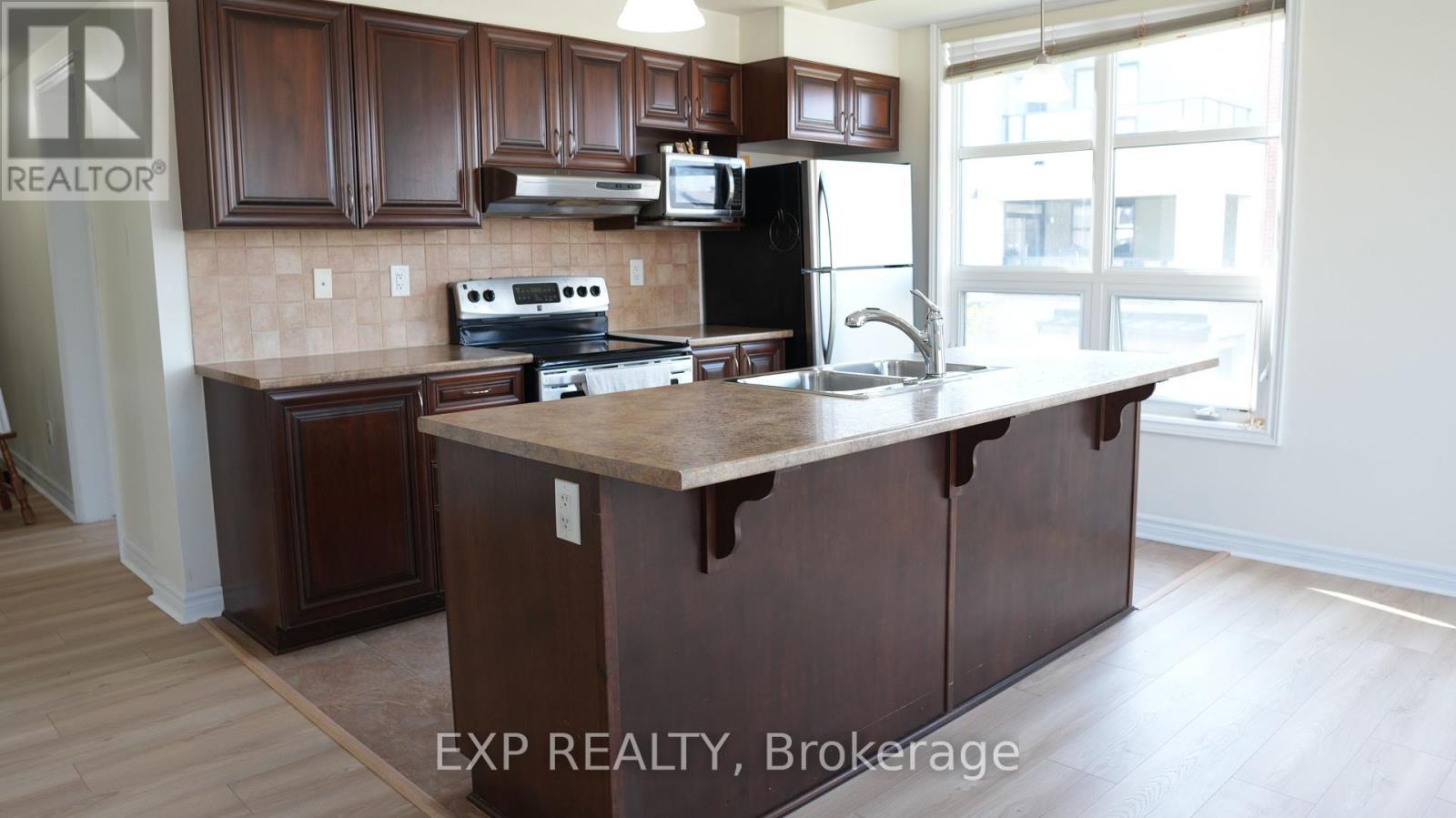 205 - 200 Glenroy Gilbert Drive