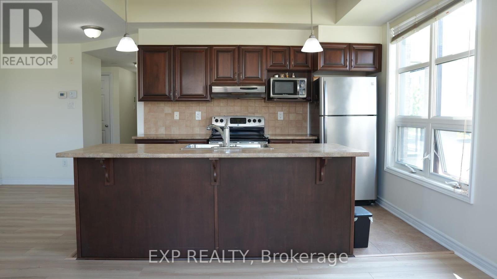 205 - 200 Glenroy Gilbert Drive