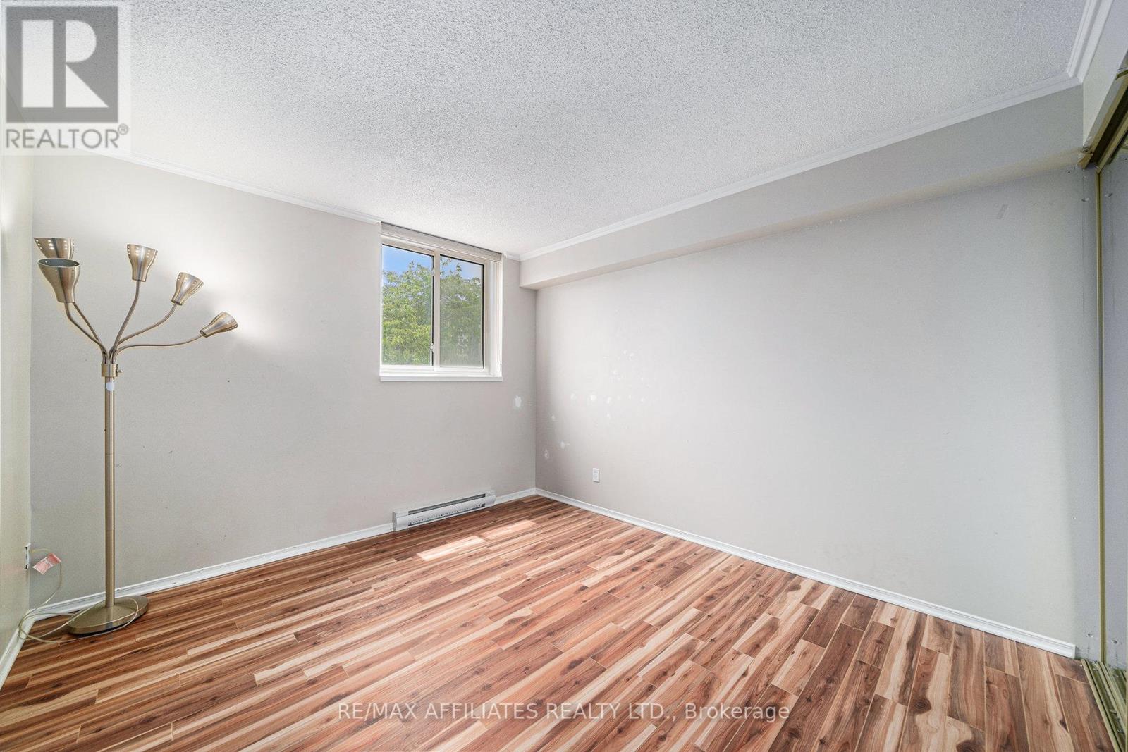 211 - 1705 Playfair Drive