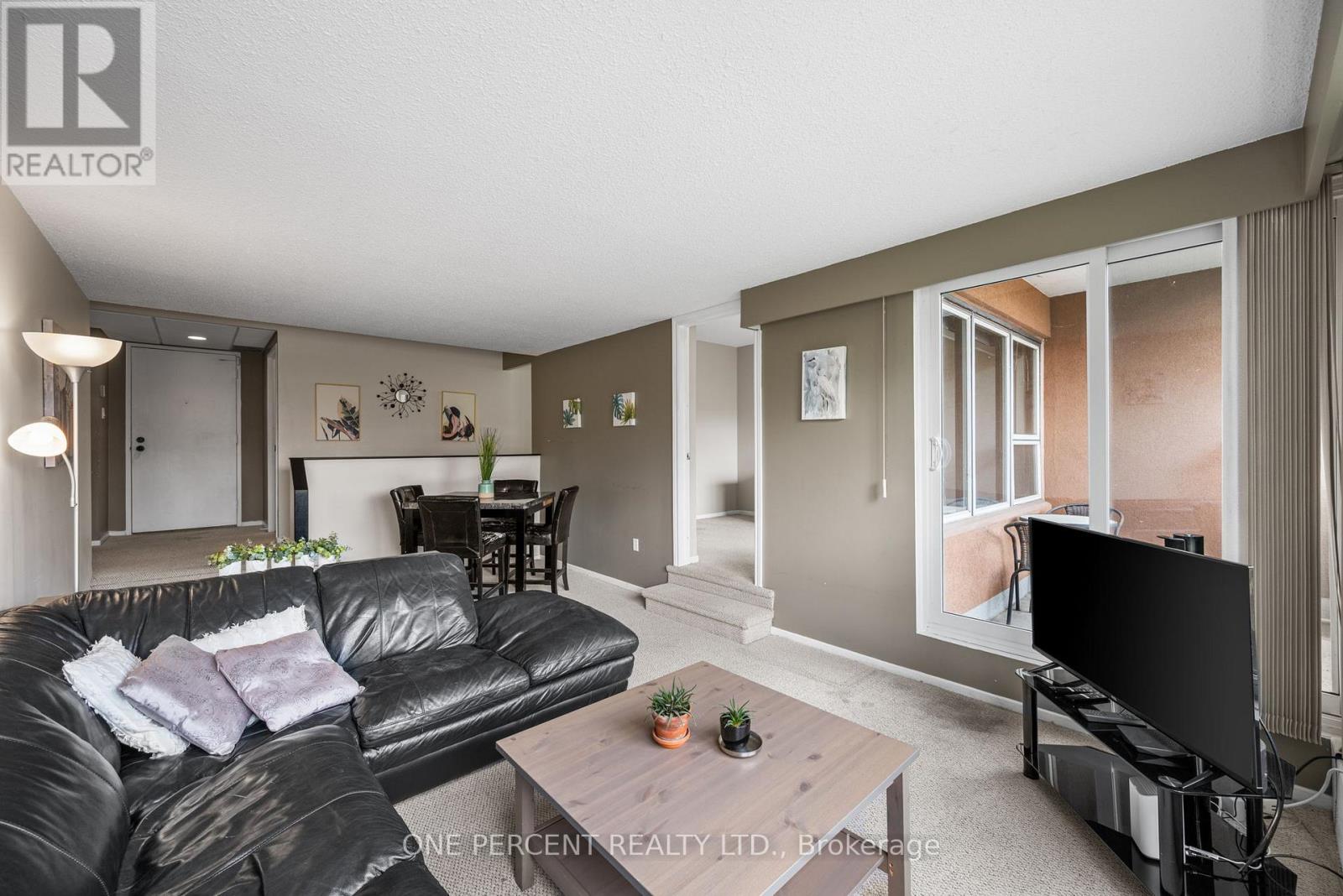 201 - 373 Laurier Avenue E