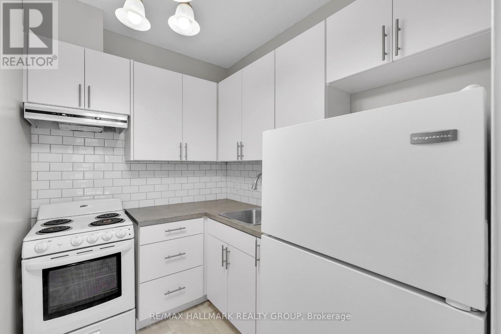 104 - 475 Laurier Avenue W