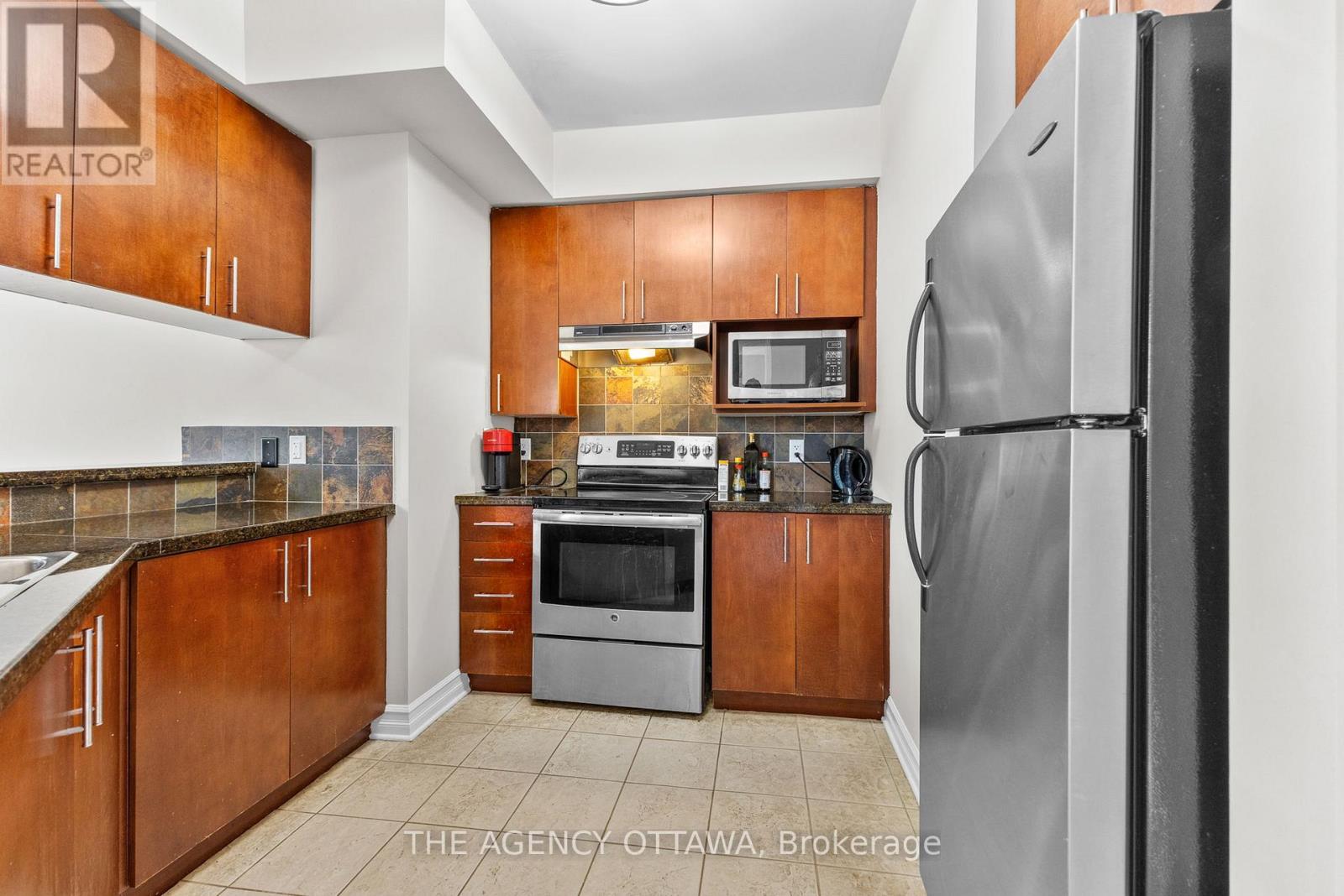 203 - 711 Churchill Avenue N