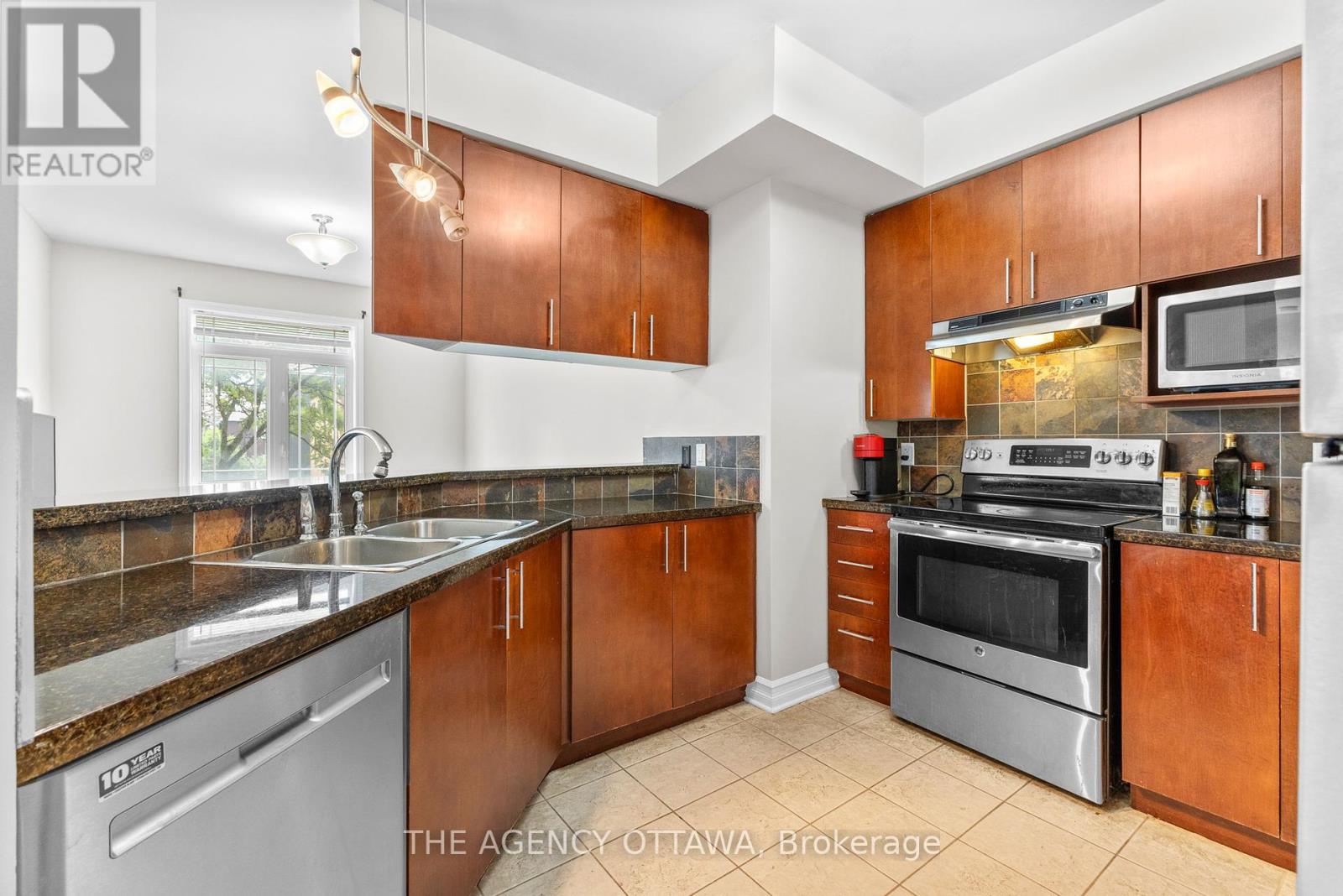 203 - 711 Churchill Avenue N