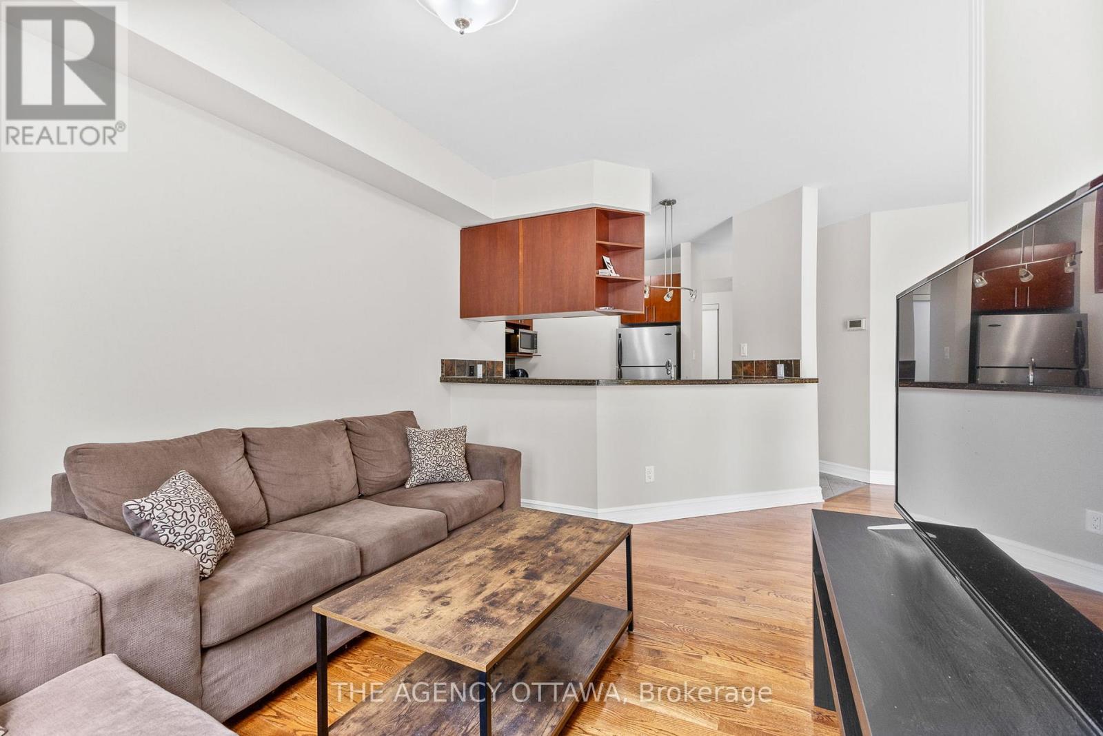 203 - 711 Churchill Avenue N