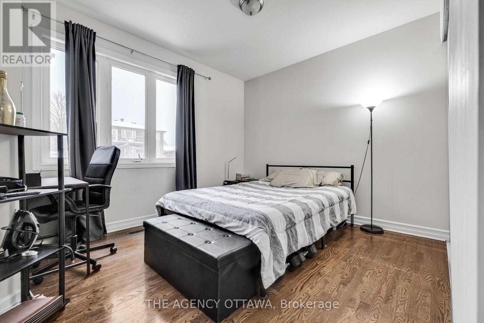 203 - 711 Churchill Avenue N