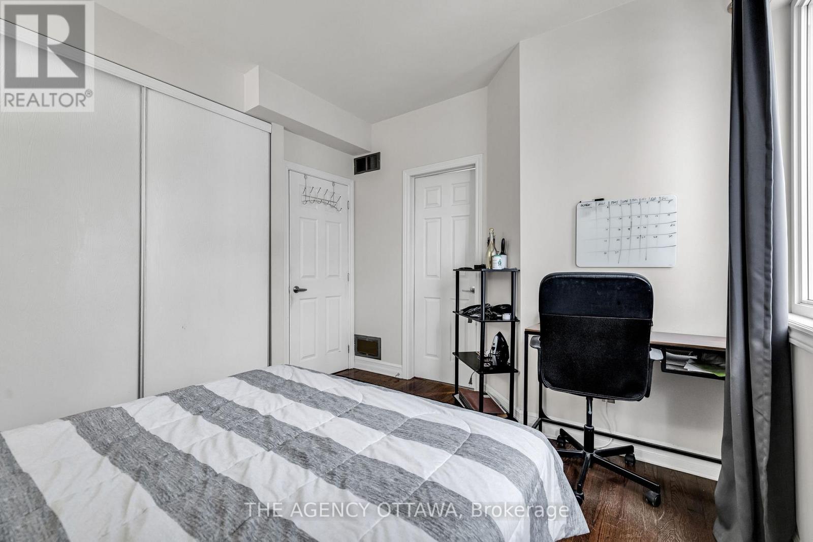203 - 711 Churchill Avenue N