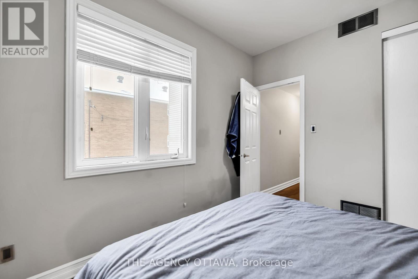 203 - 711 Churchill Avenue N