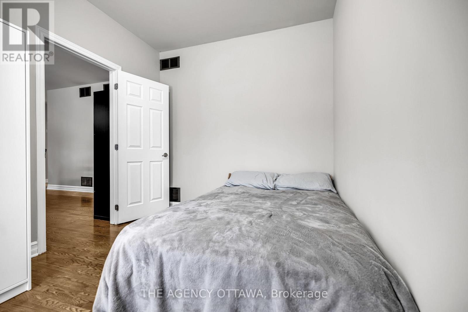 203 - 711 Churchill Avenue N