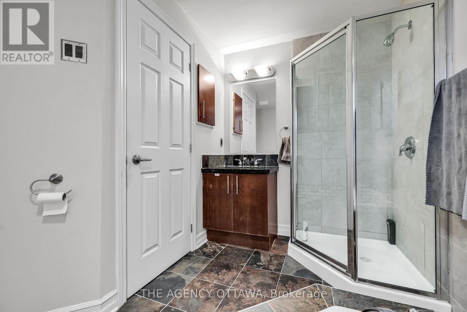 203 - 711 Churchill Avenue N