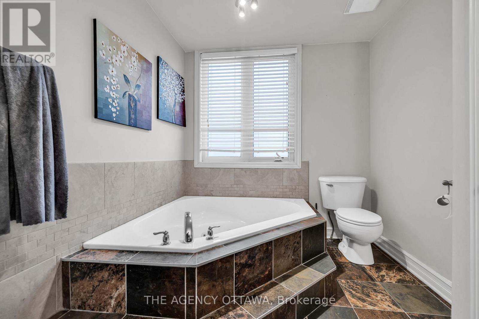 203 - 711 Churchill Avenue N
