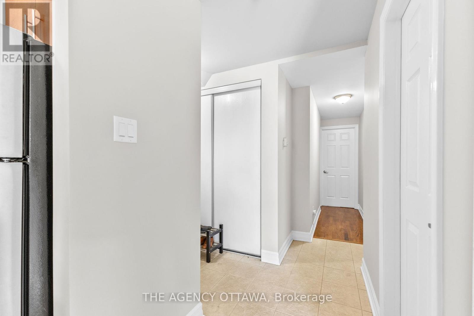 203 - 711 Churchill Avenue N
