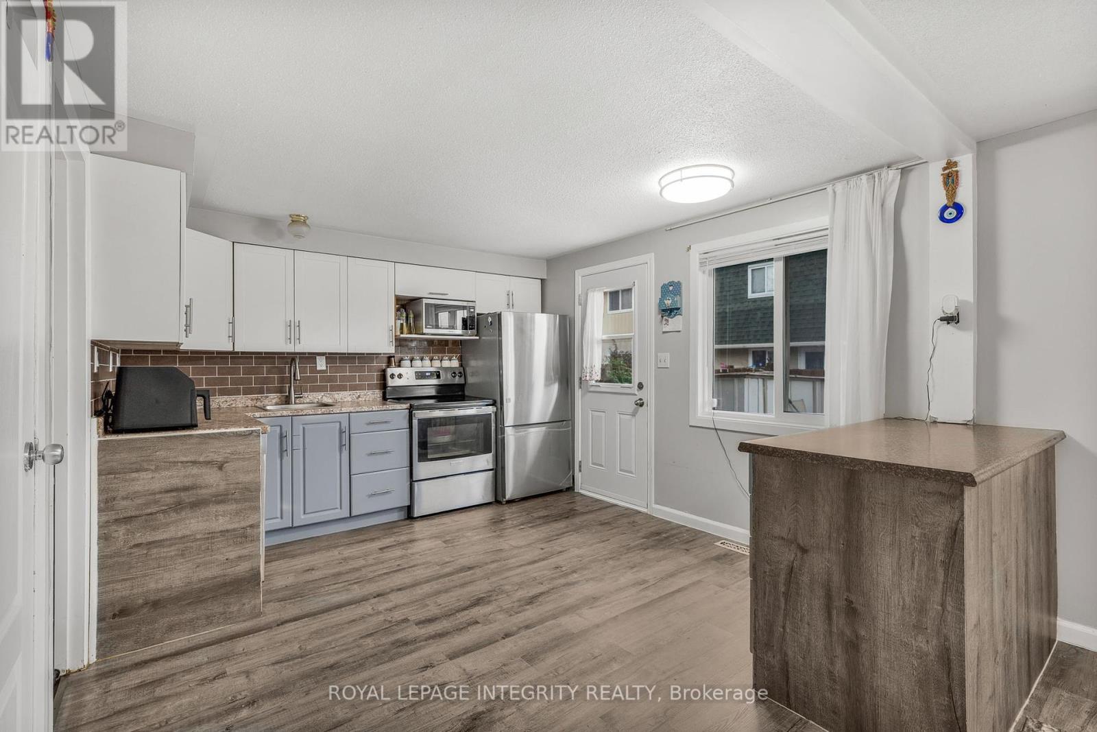 107 - 1548 Beaverpond Drive