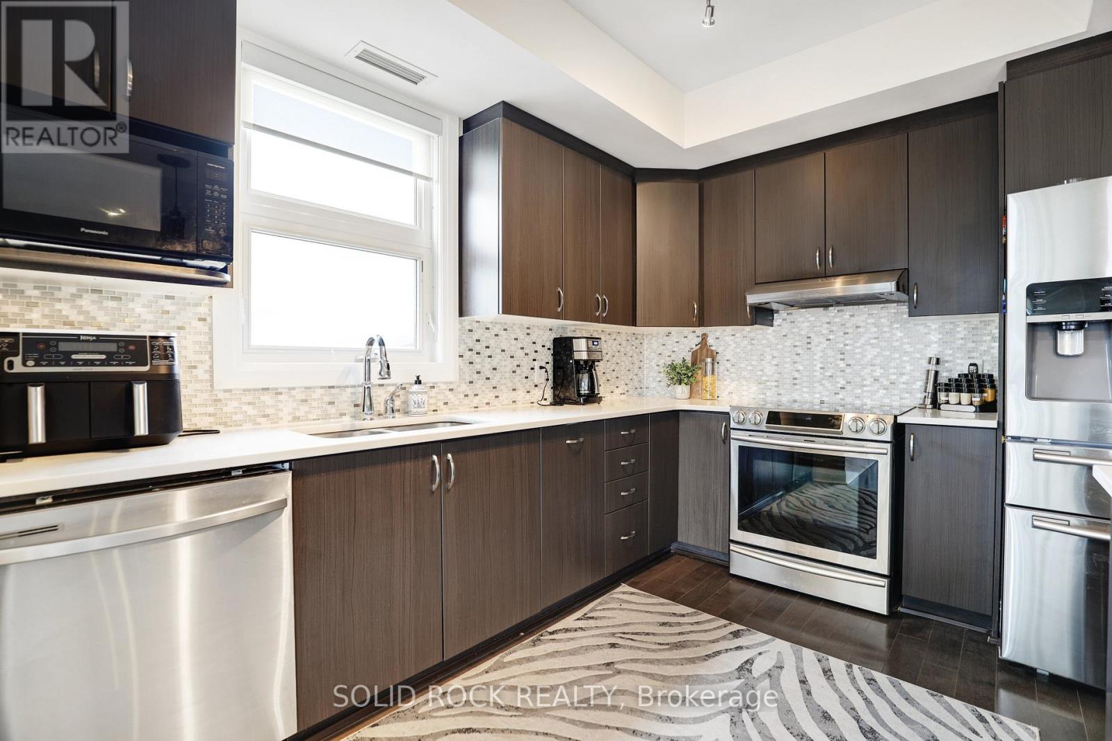 401 - 200 Glenroy Gilbert Drive