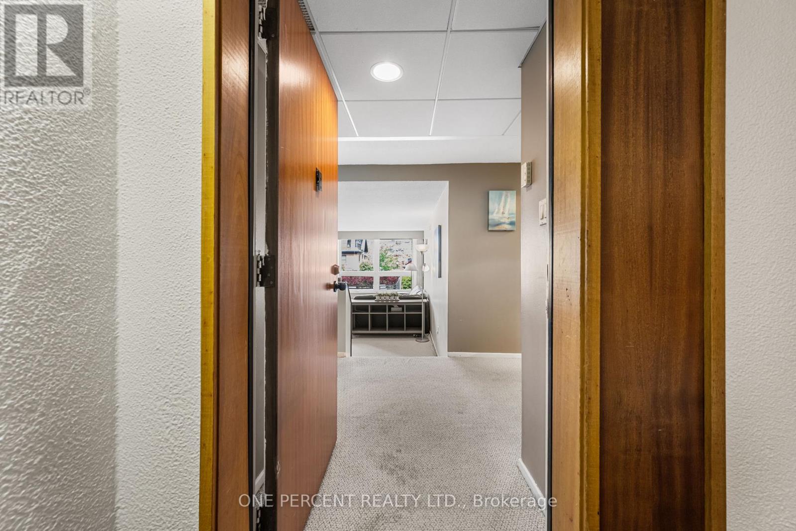 201 - 373 Laurier Avenue E