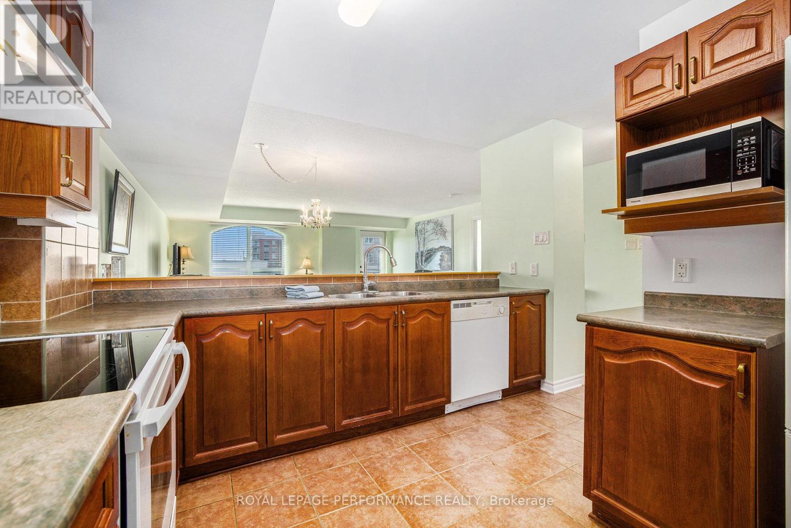 303 - 120 Grant Carman Drive