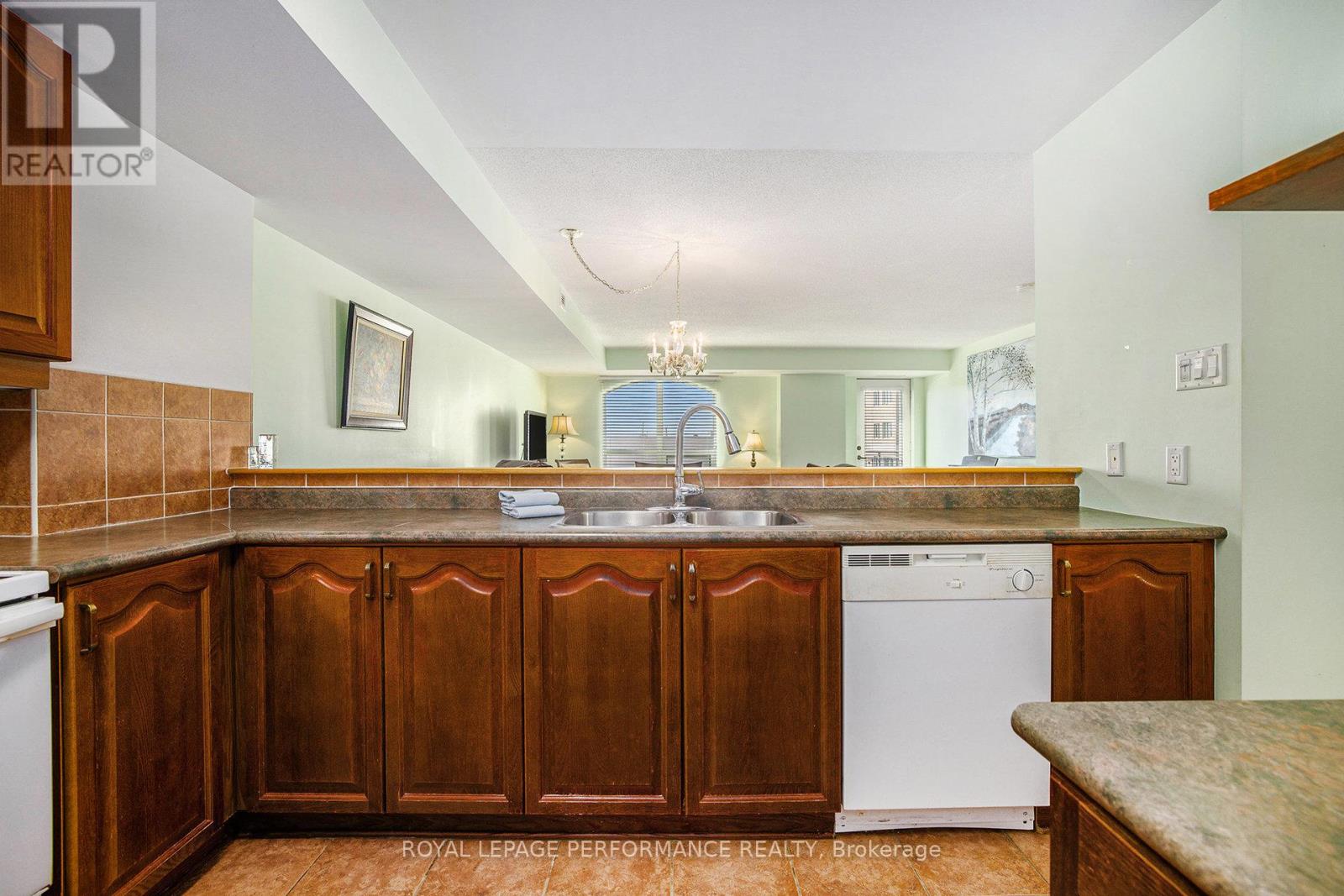 303 - 120 Grant Carman Drive