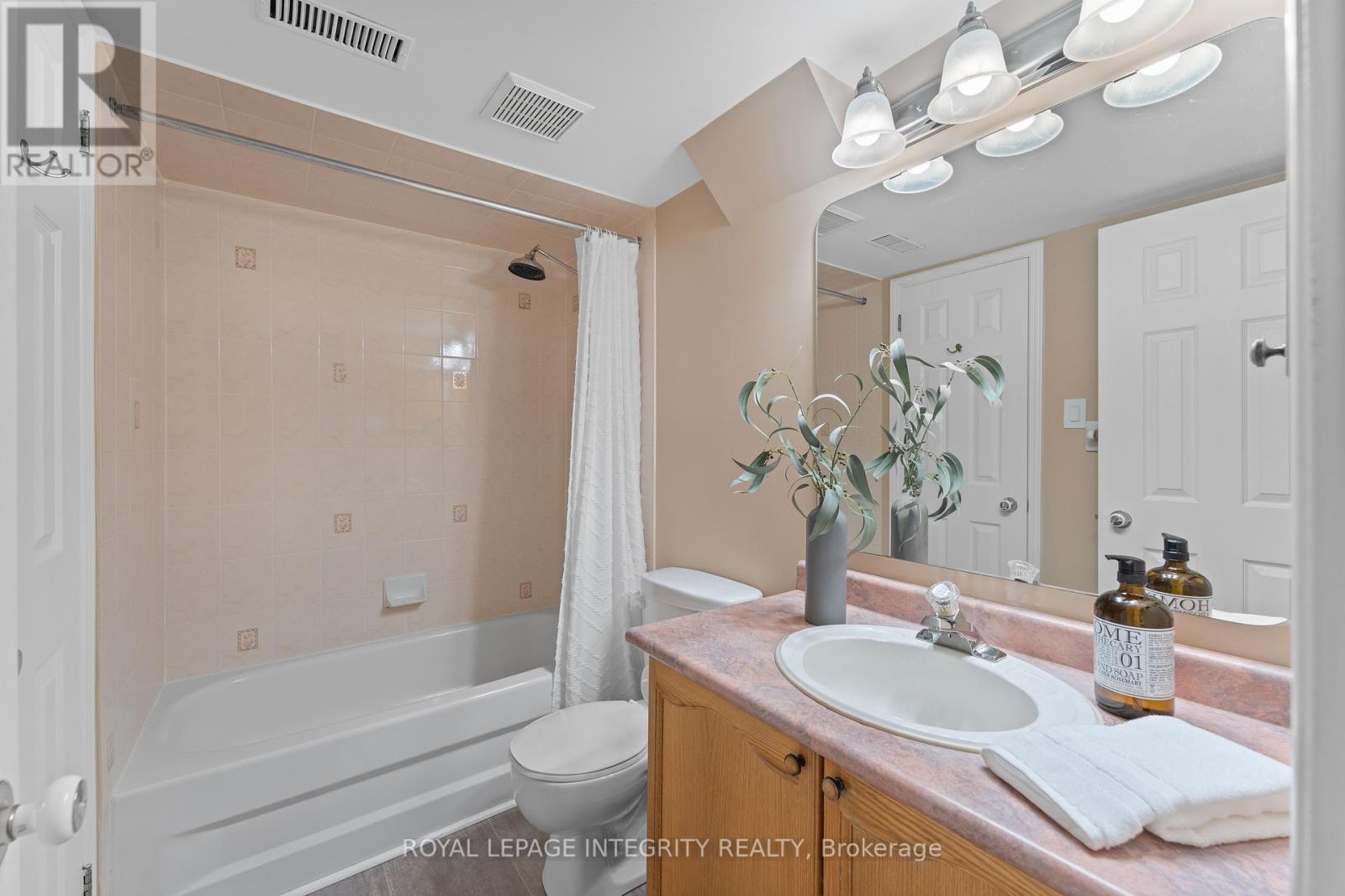 E - 108 Centrepointe Drive