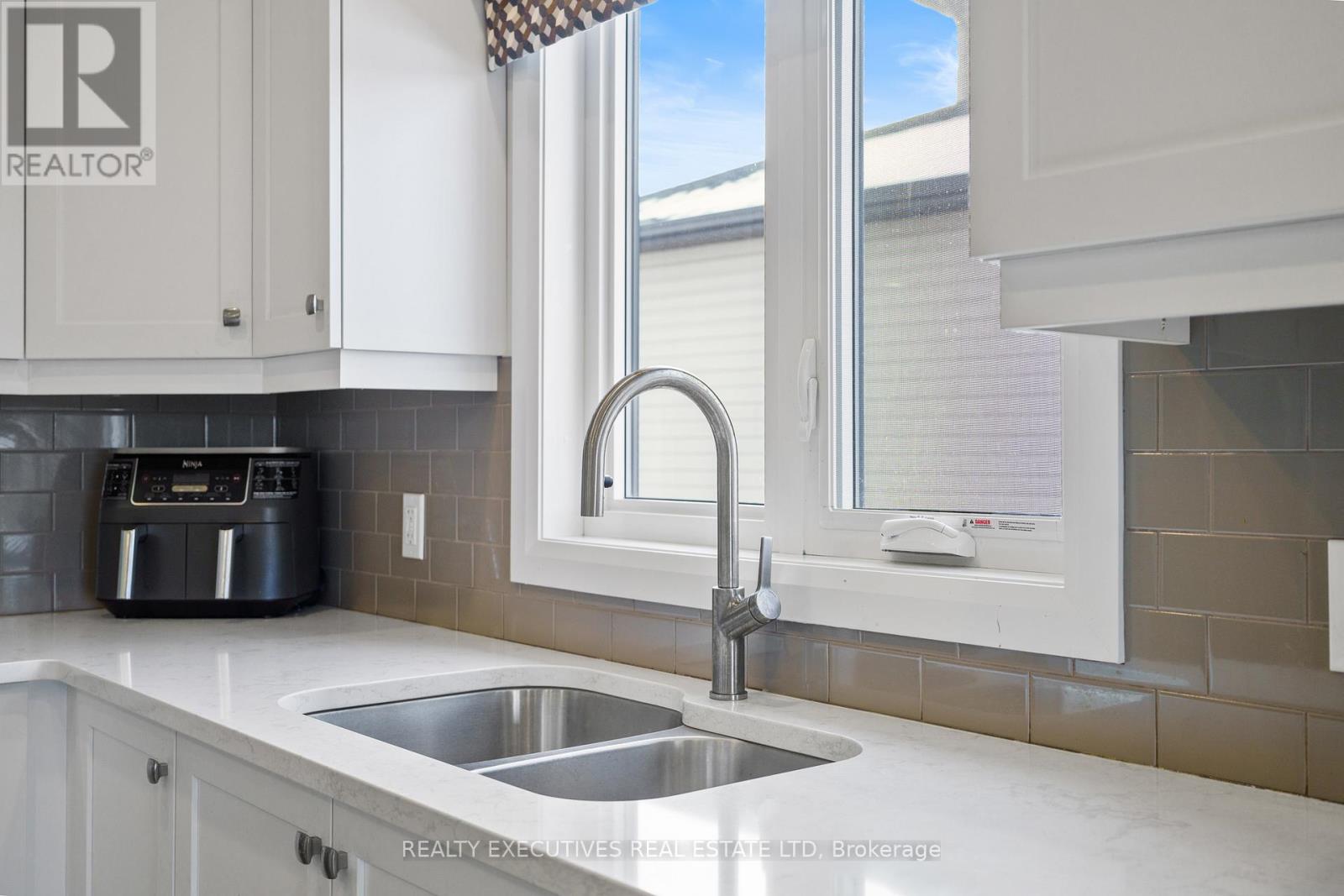 460 Arora Crescent S