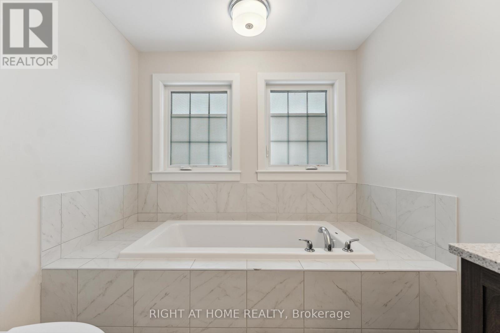 632 Moonflower Crescent W