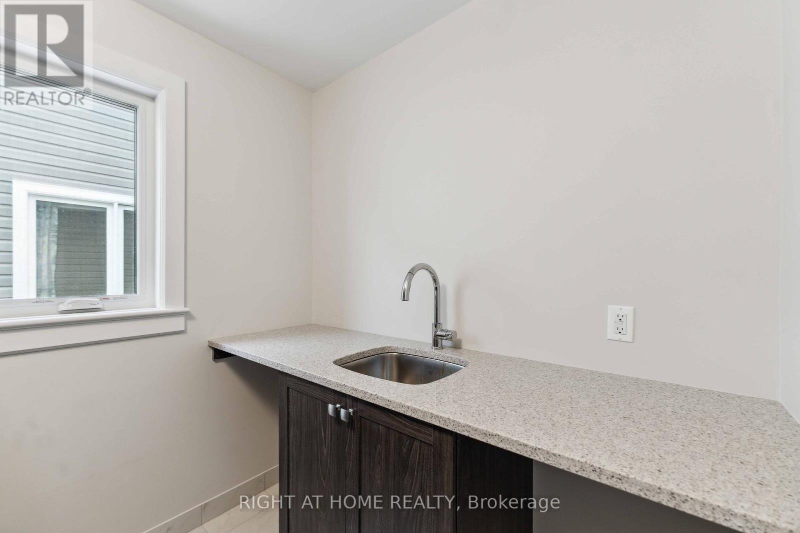 632 Moonflower Crescent W