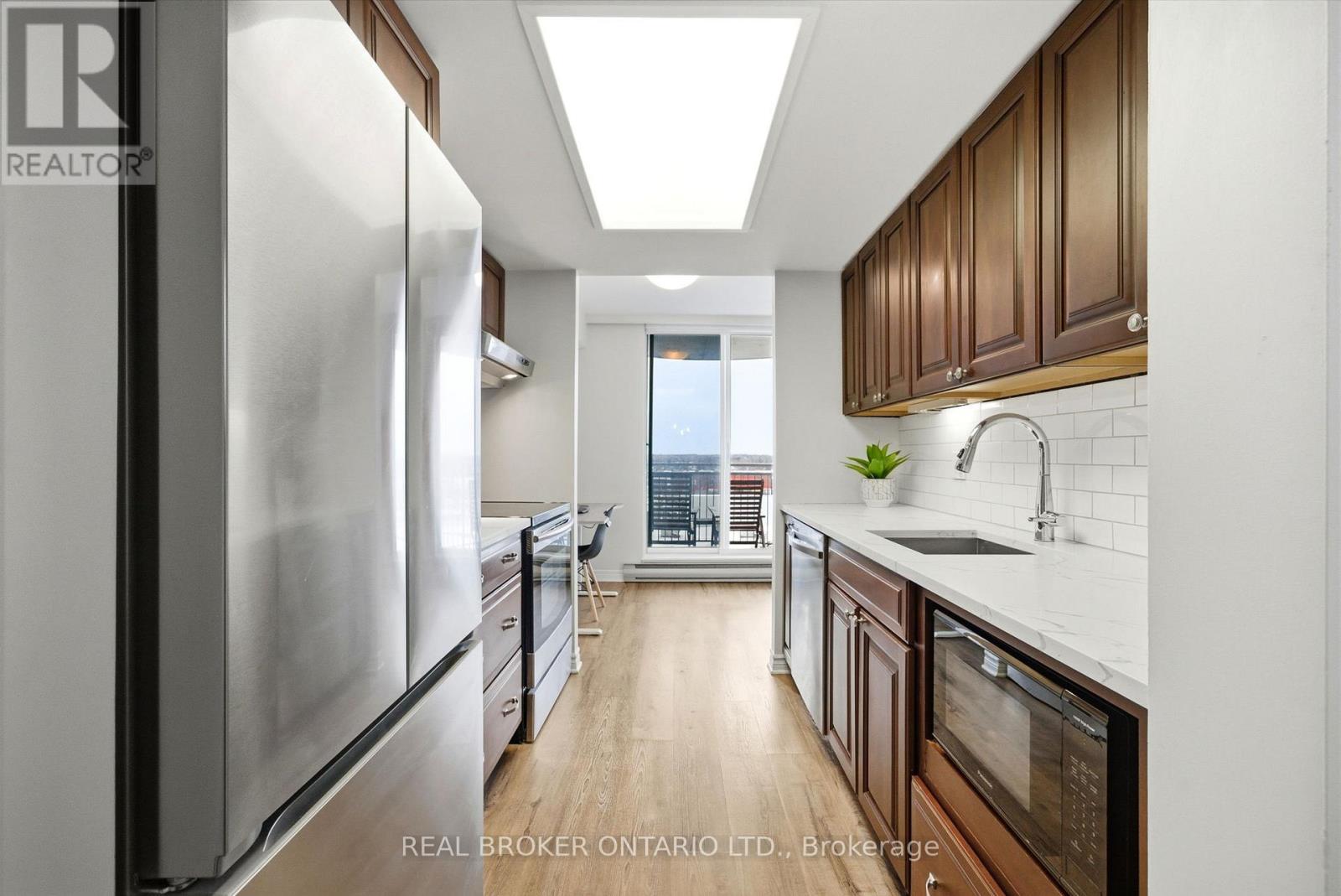 703 - 100 Grant Carman Drive