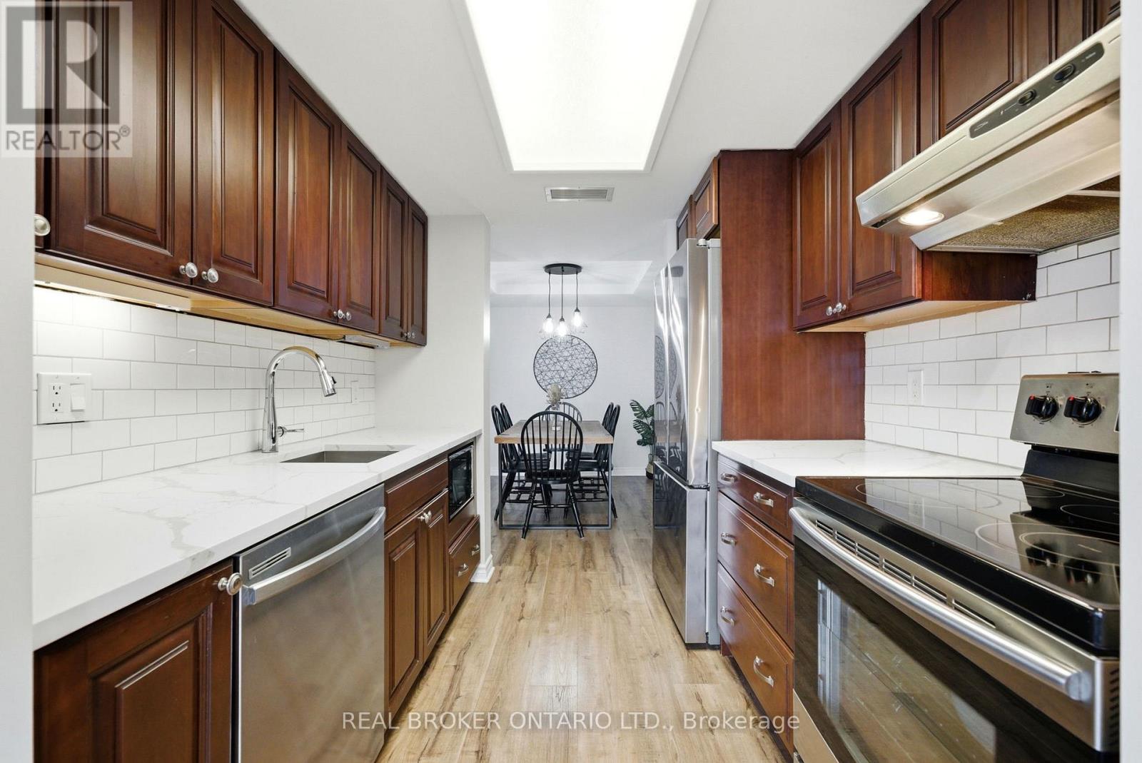 703 - 100 Grant Carman Drive