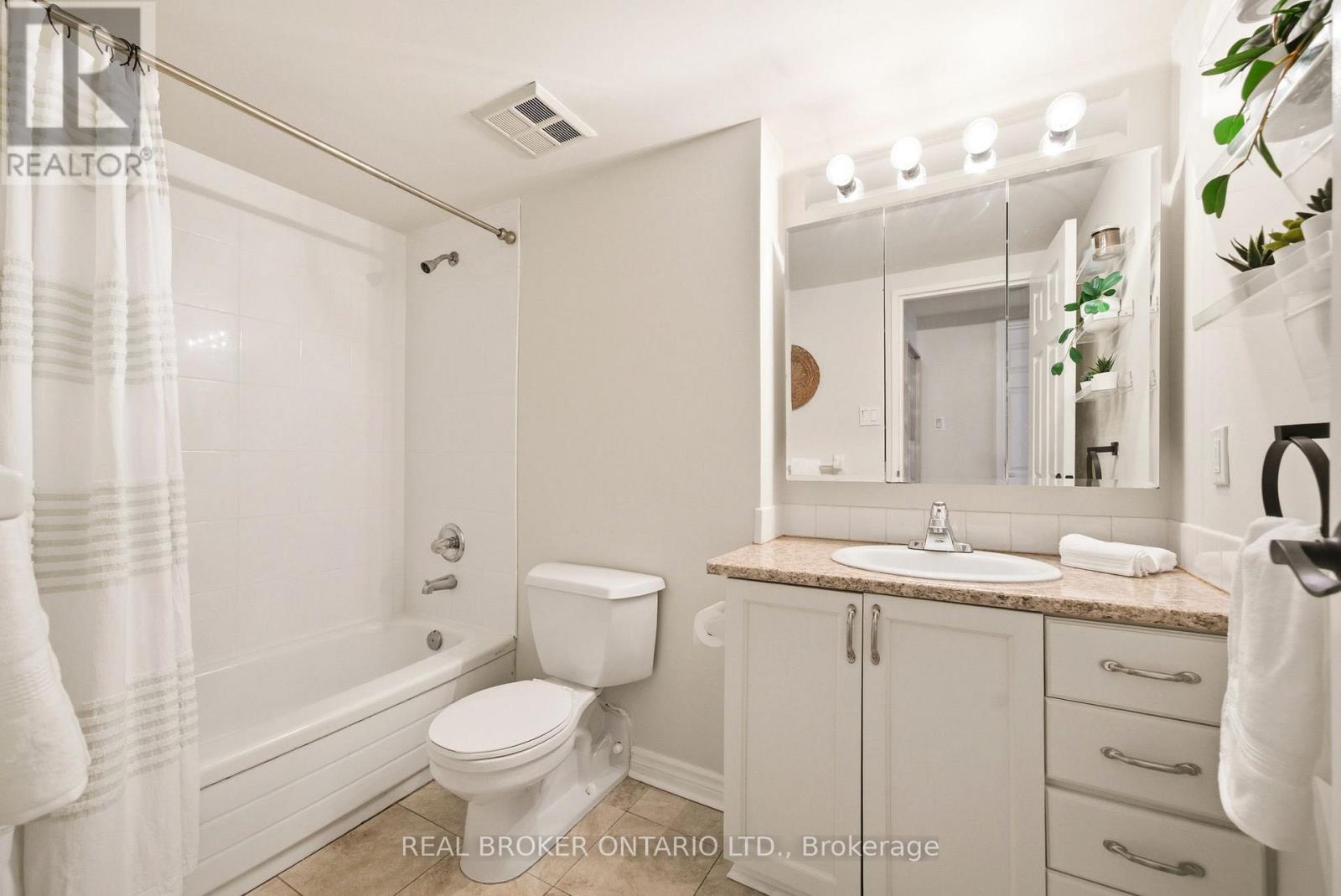 703 - 100 Grant Carman Drive