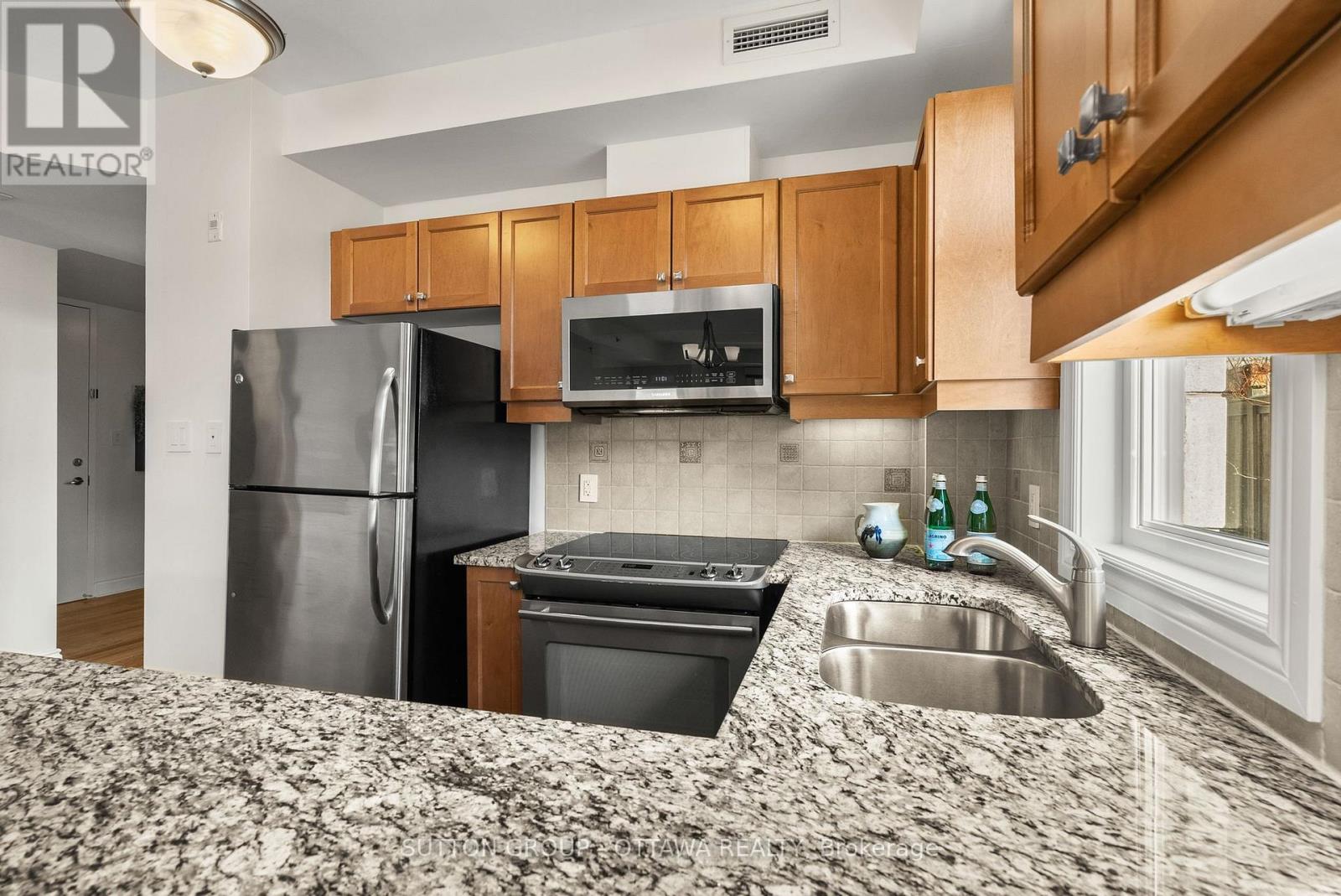 105 - 323 Winona Avenue