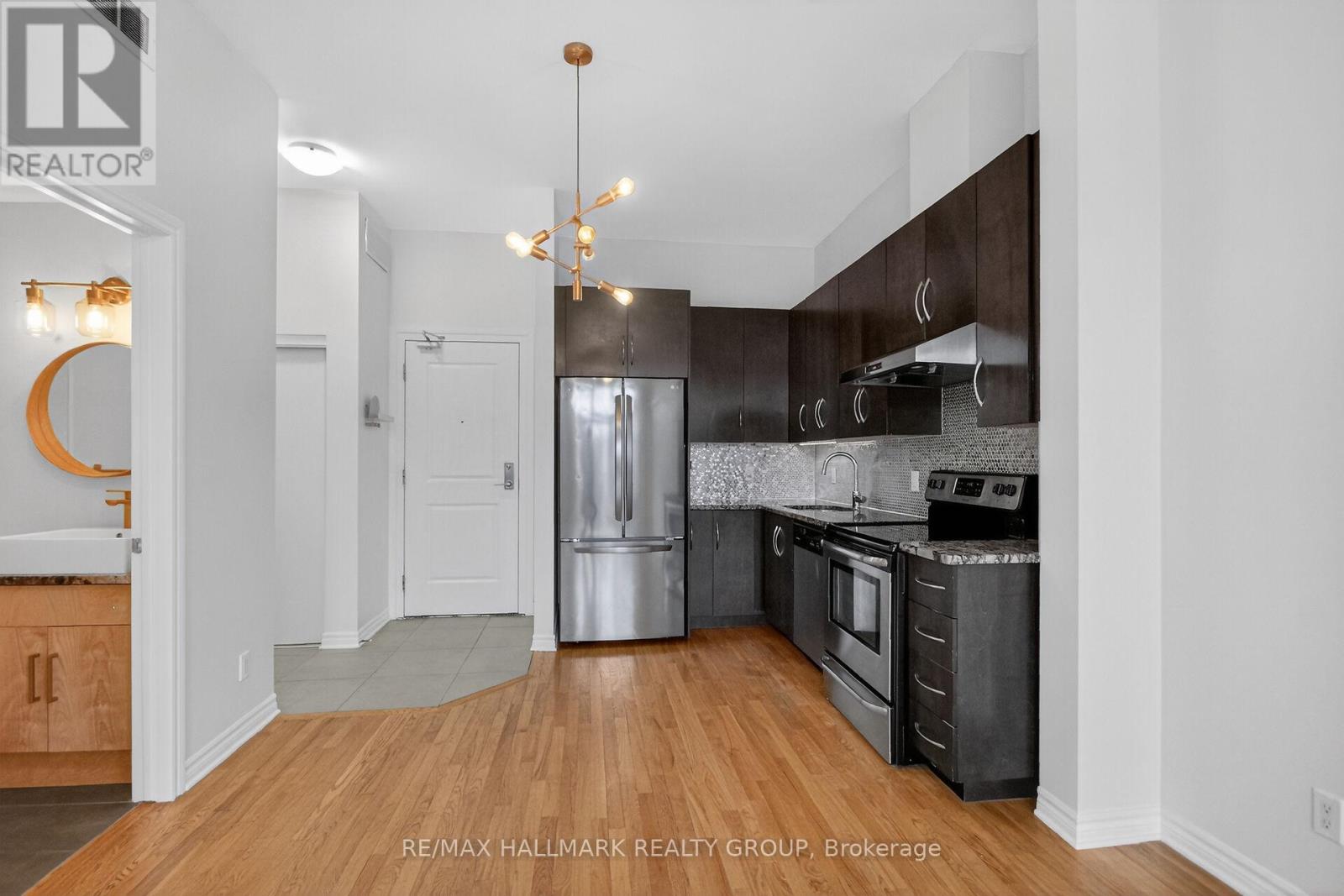 210 - 682 Churchill Avenue N