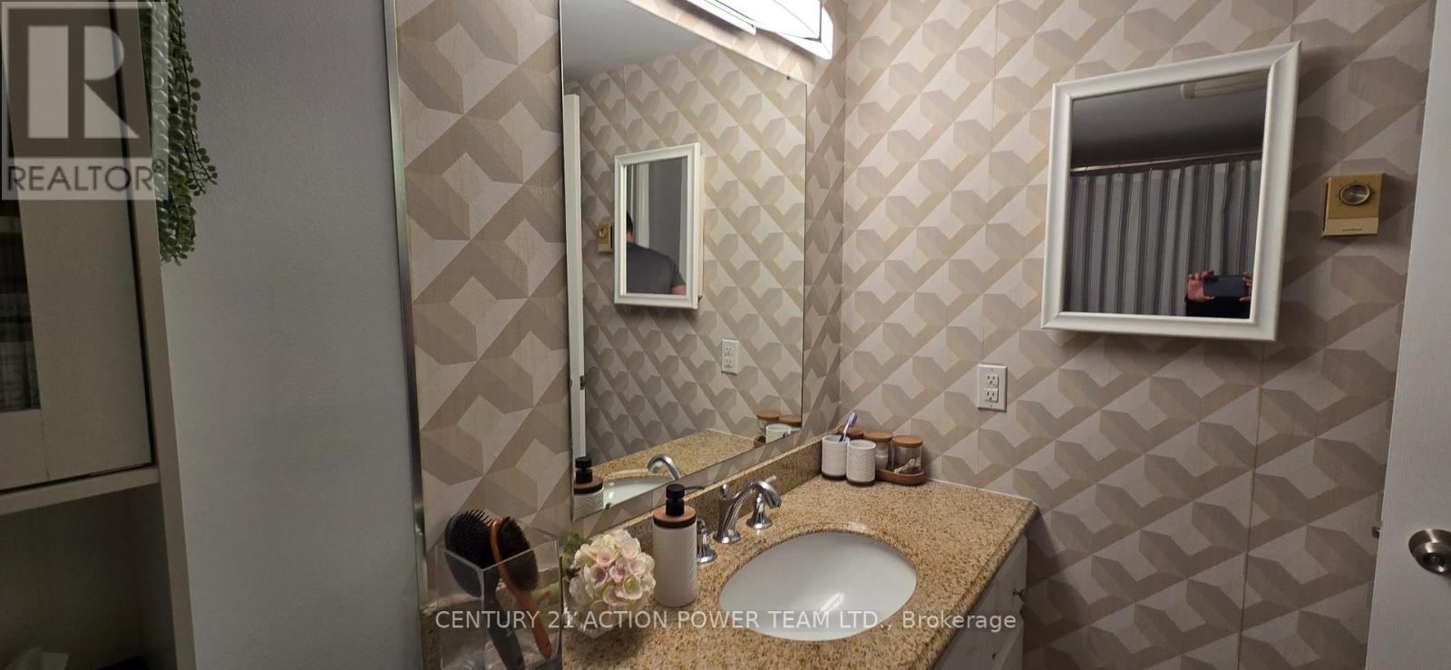 110 - 316 Savard Avenue