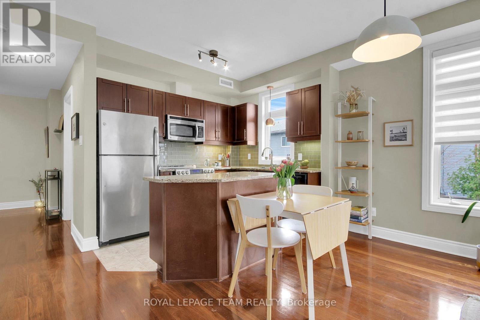 208 - 323 Winona Avenue