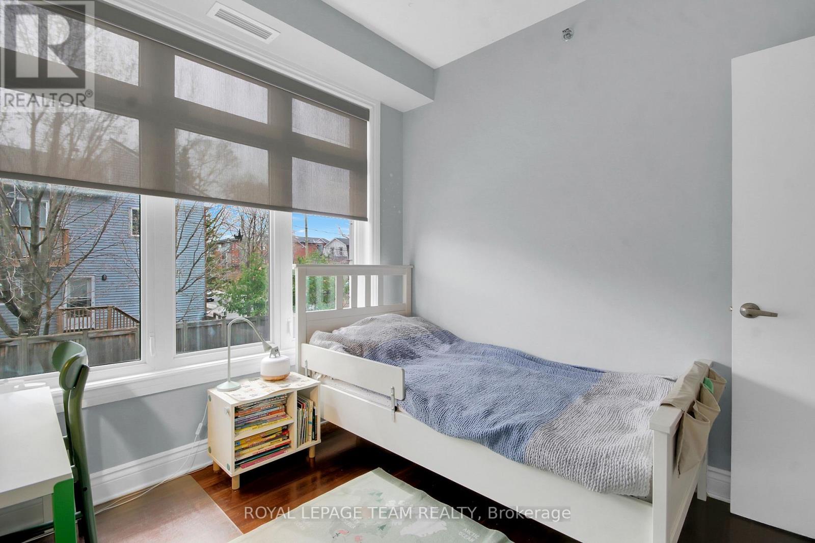 208 - 323 Winona Avenue